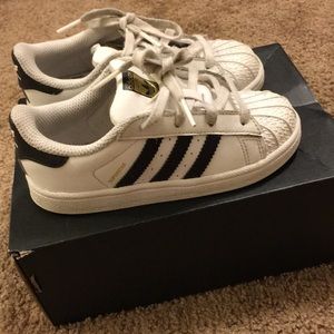 White and black adidas shoes 👟